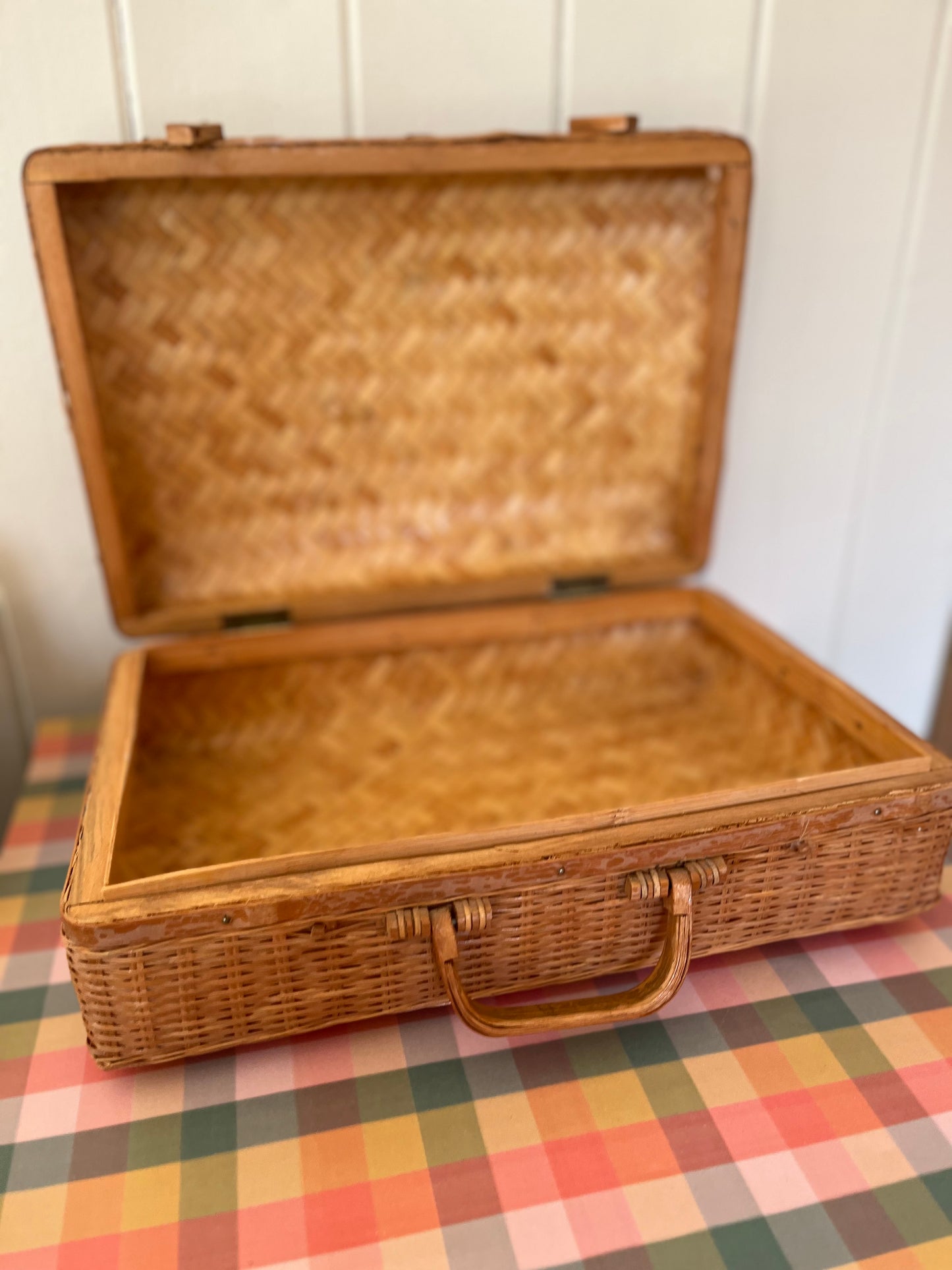 Vintage wicker suitcase